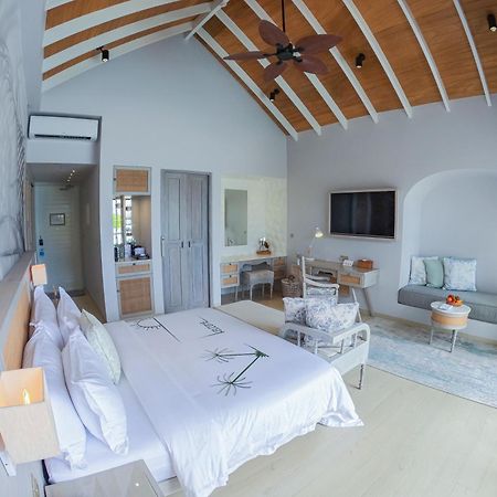 منتجع مالاهيني كودا باندوس هولهومالي المظهر الخارجي الصورة A bedroom at the resort