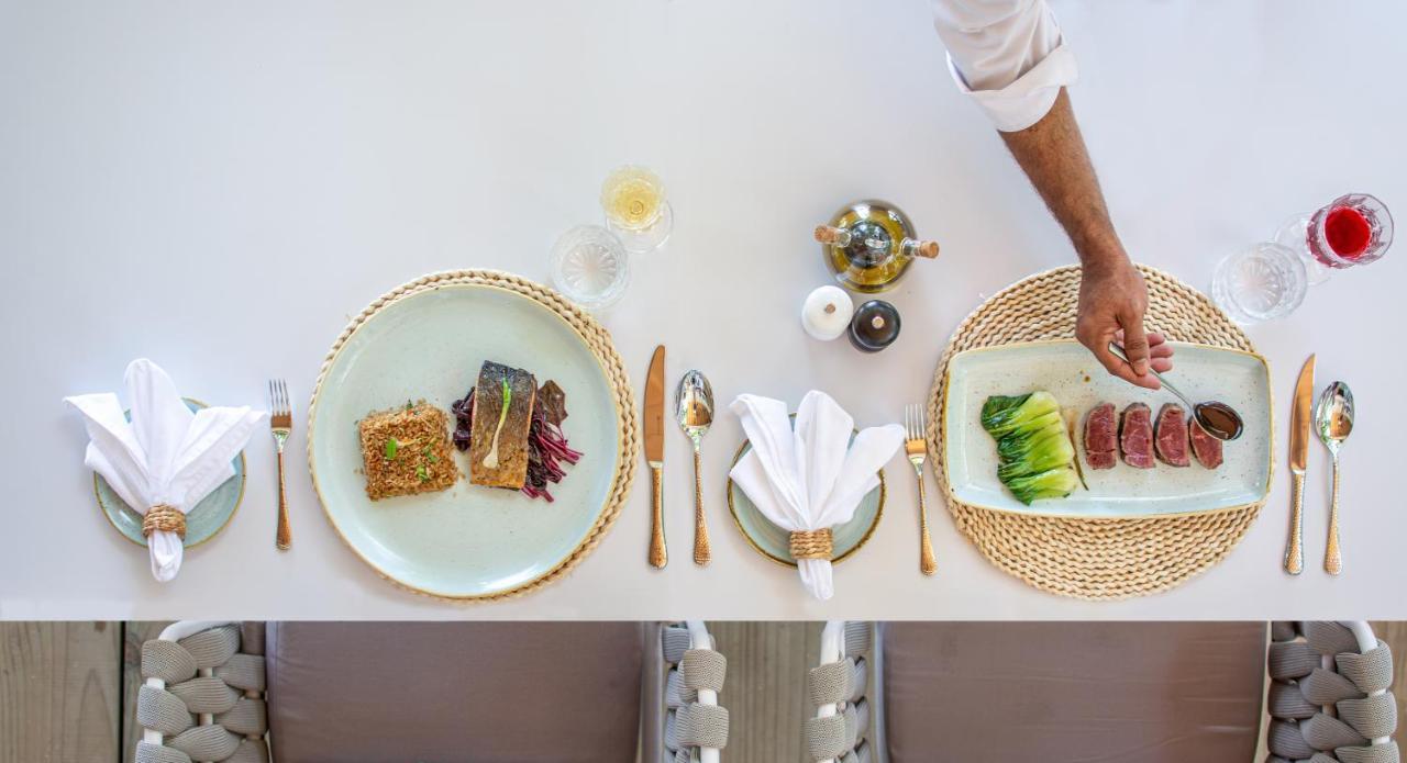 منتجع مالاهيني كودا باندوس هولهومالي المظهر الخارجي الصورة A place setting
