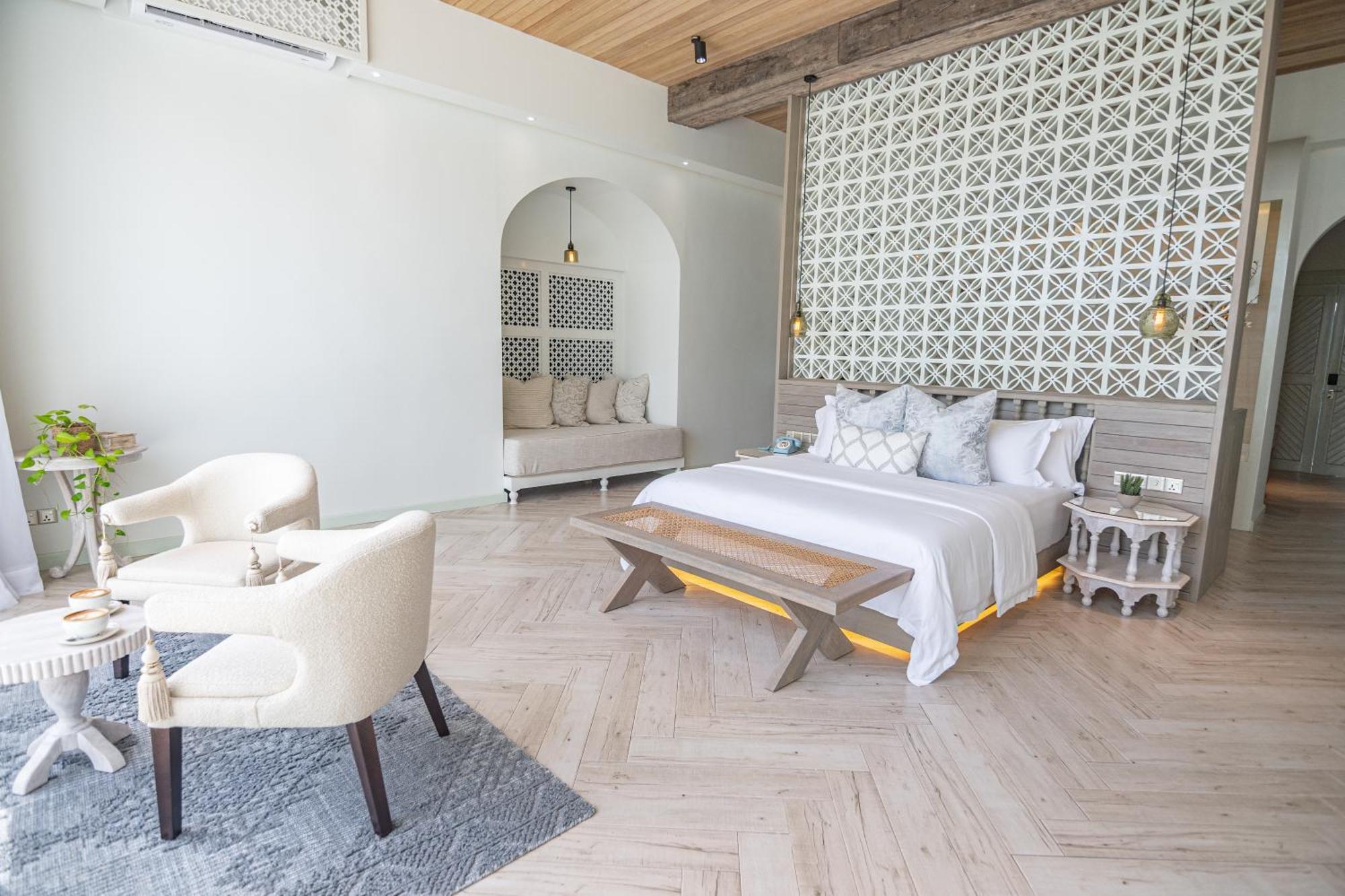 منتجع مالاهيني كودا باندوس هولهومالي المظهر الخارجي الصورة A bedroom at the hotel